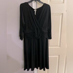 Black mid length dress with 3/4 sleeves